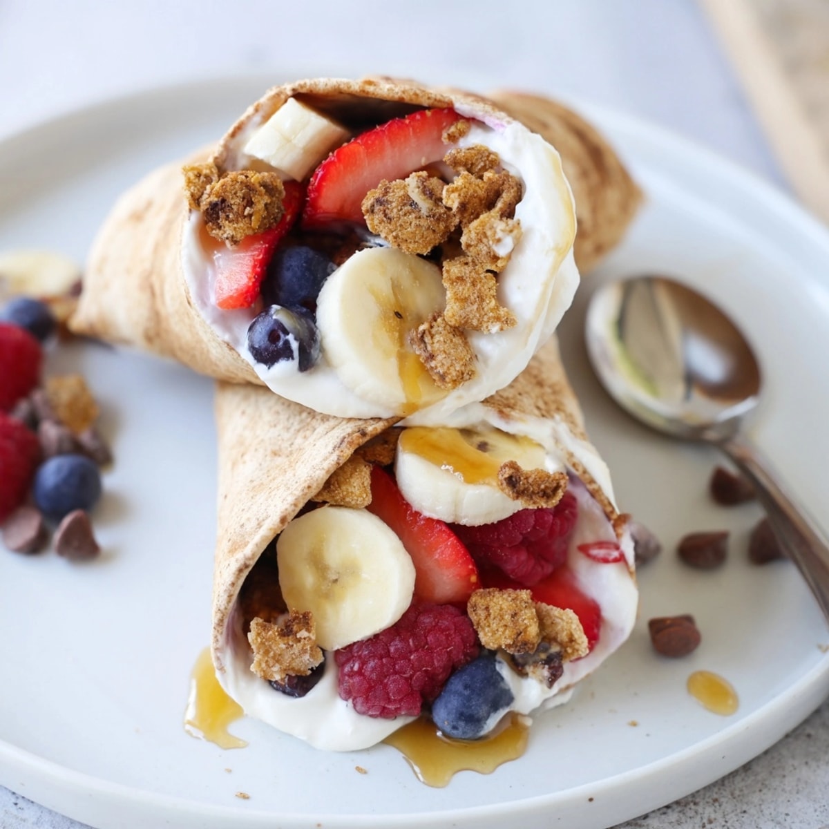 Cinnamon Toast Crunch Breakfast Wraps: Golden tortillas filled with creamy yogurt and crunchy cereal.