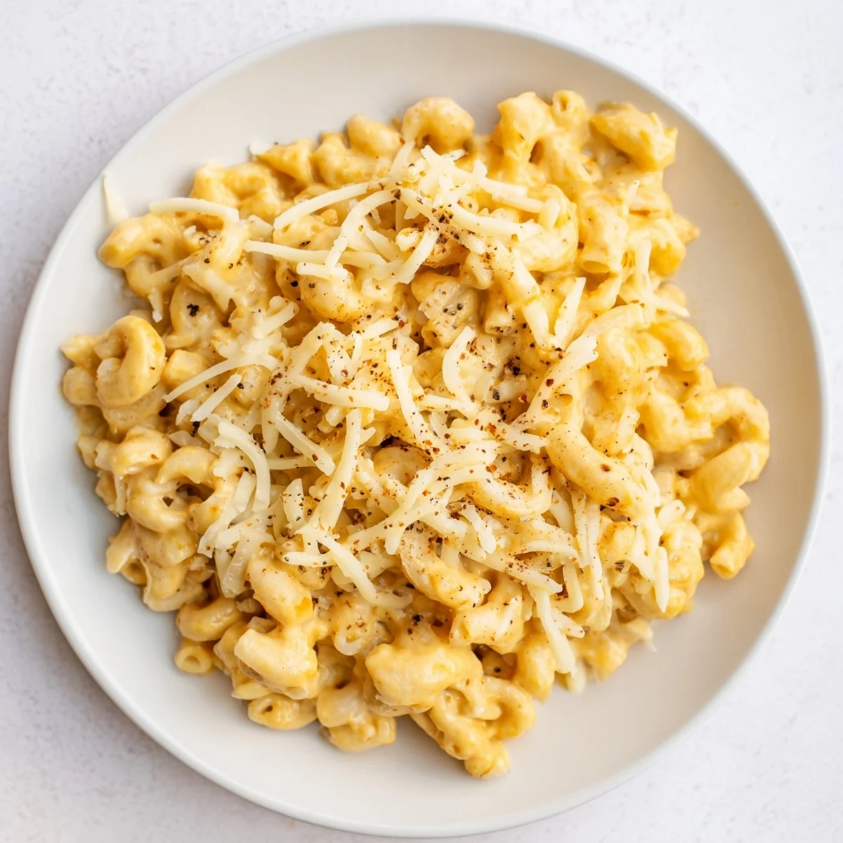 A steaming bowl of comforting One-Pot Butternut Squash Mac & Cheese, perfect for a cozy weeknight meal.