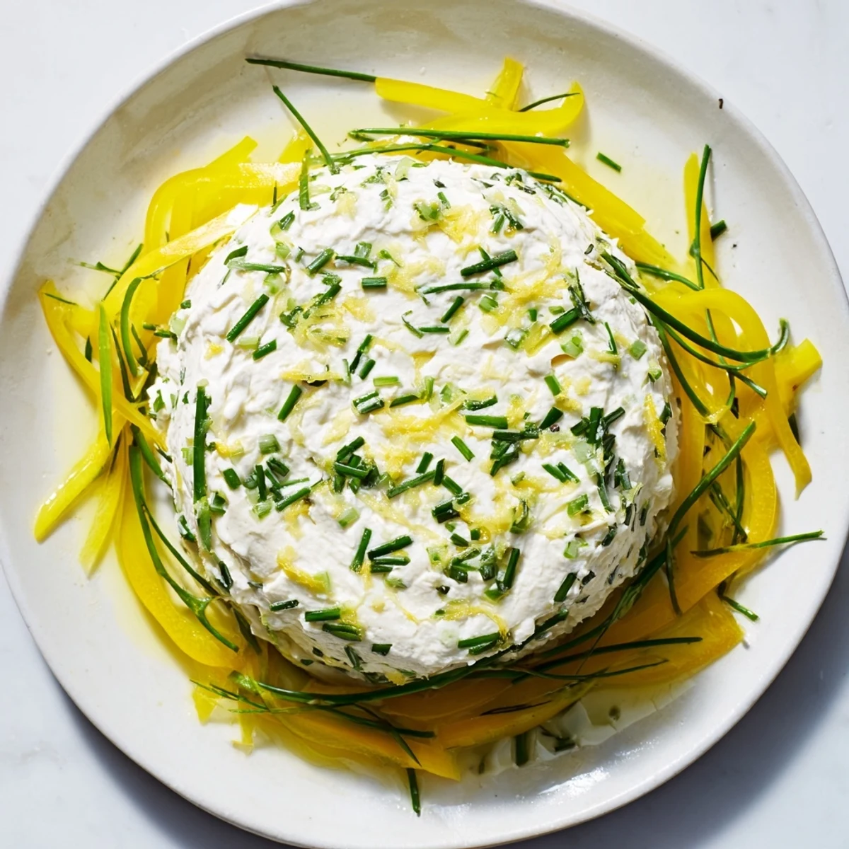 Freshly prepared Tuscan Sunburst features a vibrant yellow pepper sunburst design with flavorful goat cheese.