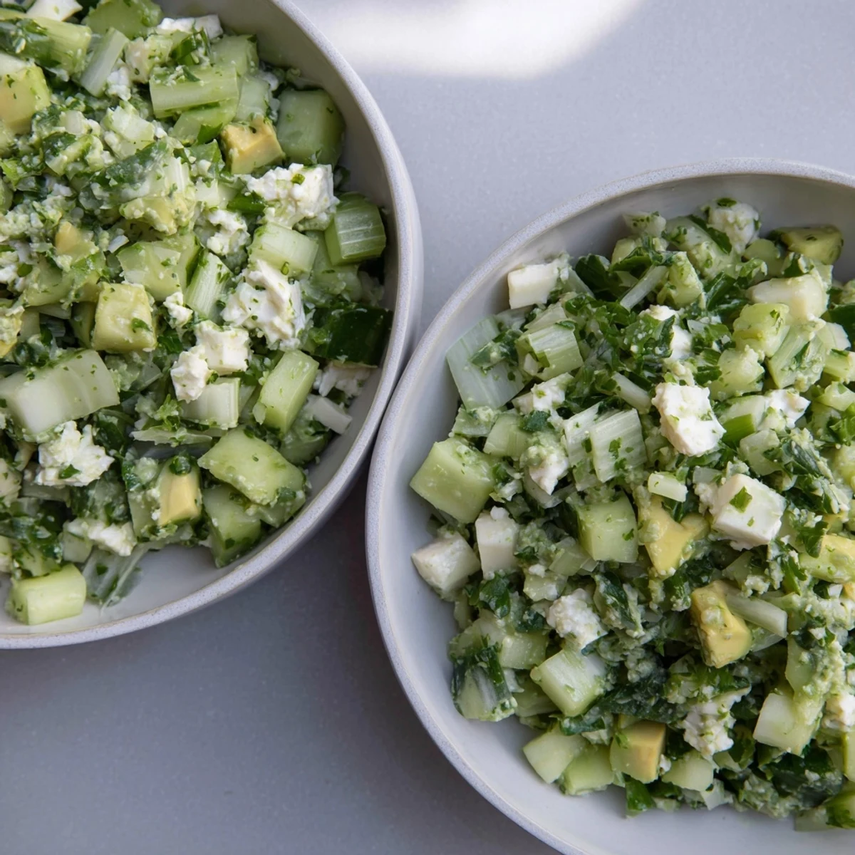 Showcasing a bowl of Green Goddess Cabbage Dip, the bright flavors are ready to be scooped up.