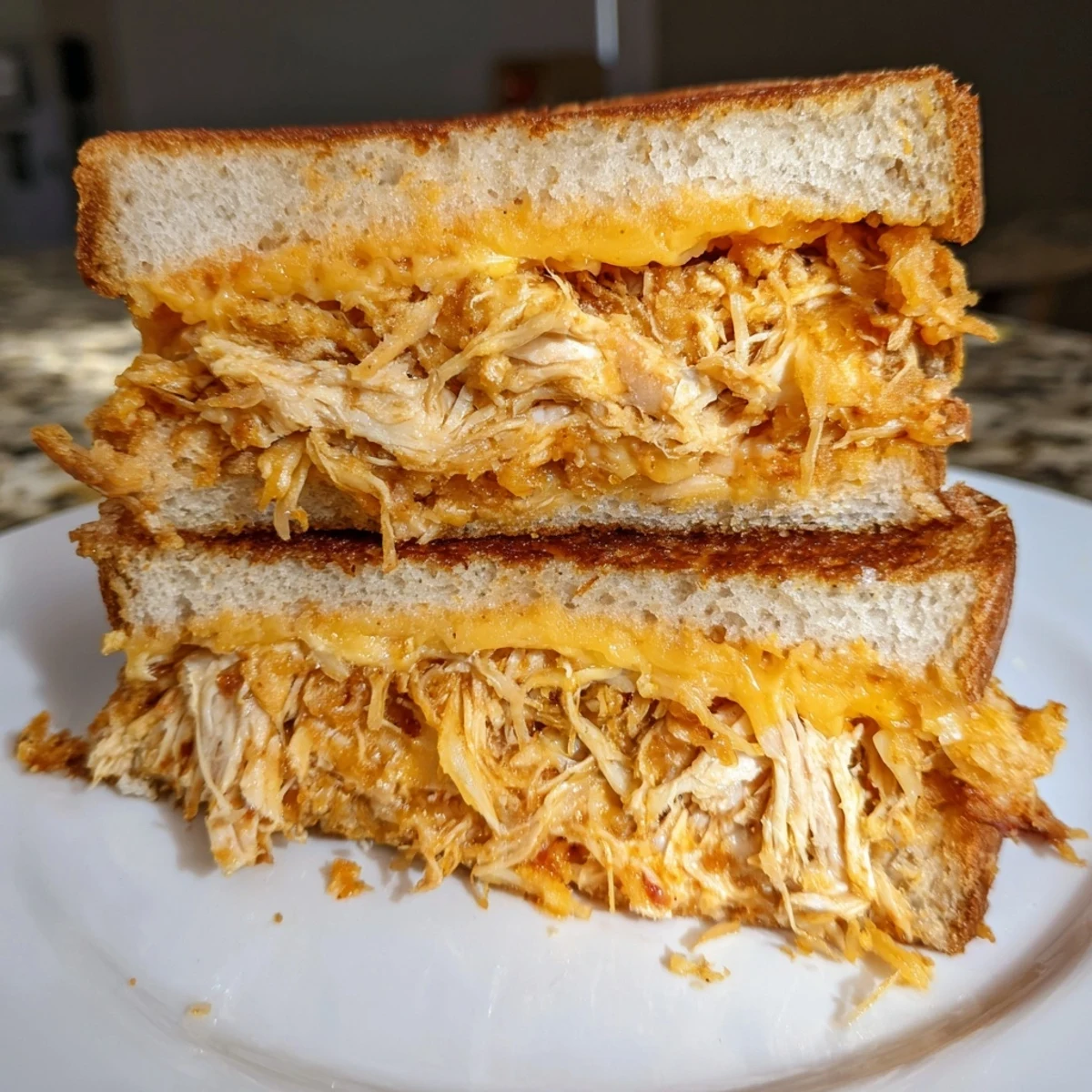 Imagine biting into a cheesy, golden Spicy Crispy Chicken Sandwich Grilled Cheese, packed with flavor.