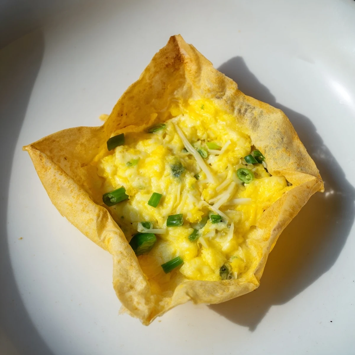 Golden-brown Rice Paper Egg & Cheese Fold with melted cheese and crispy edges, ready to eat!