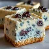 Sweet no-bake lemon blueberry cheesecake bars perfect for easy summer dessert.