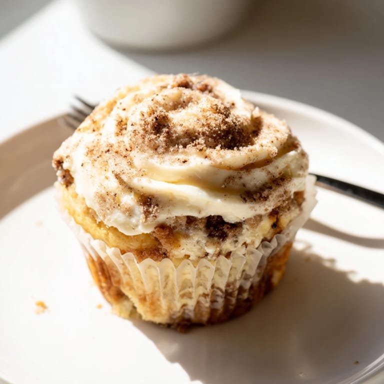 Chai Latte Muffin Cheesecake Cups with muffin base and rich cheesecake, a delightful fusion treat.