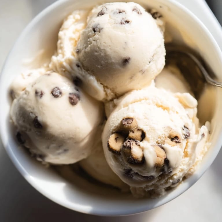 Delightful Cottage Cheese Ice Cream topped with edible cookie dough and chocolate chips.  